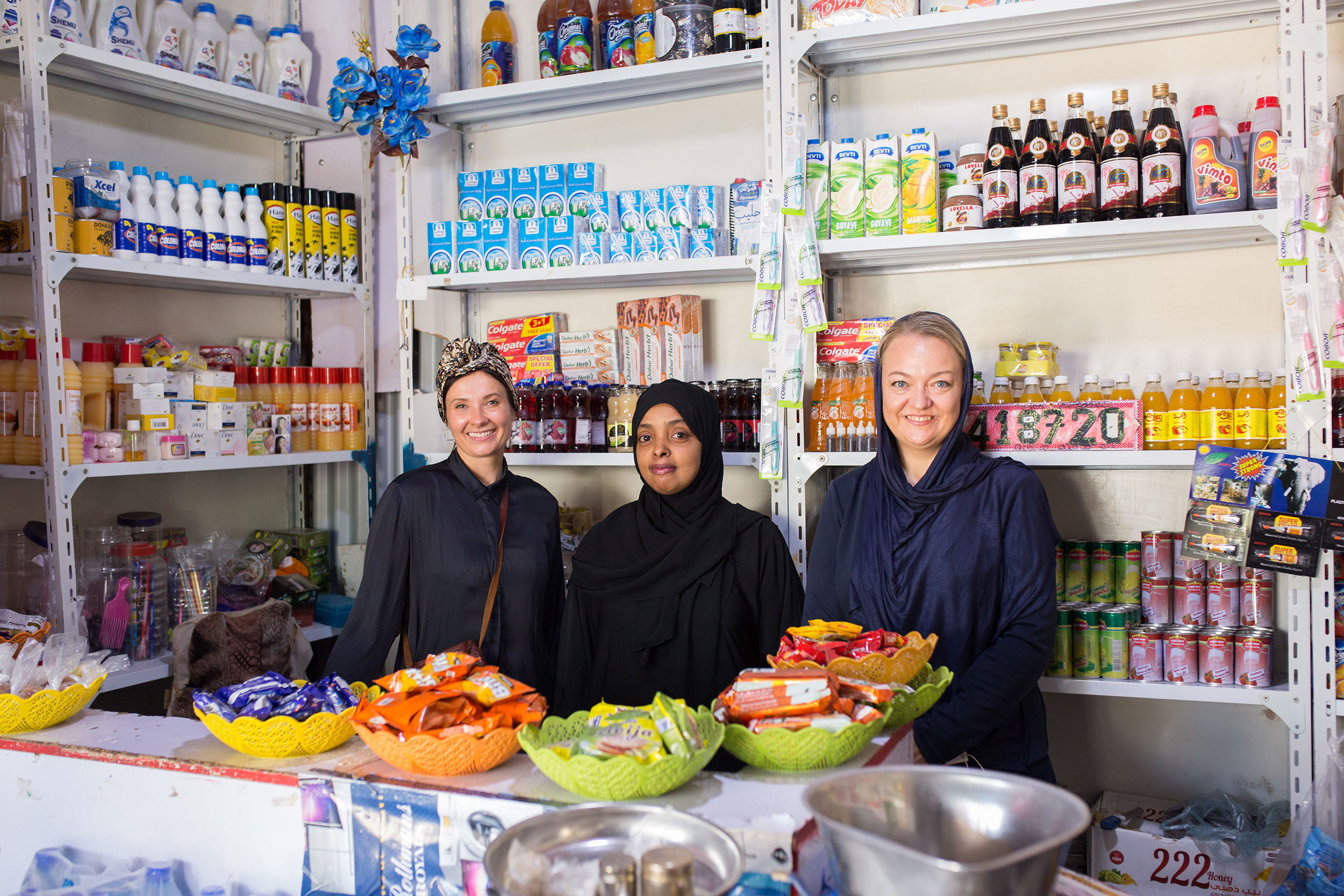 SIDA Reps with a Somali woman business owner