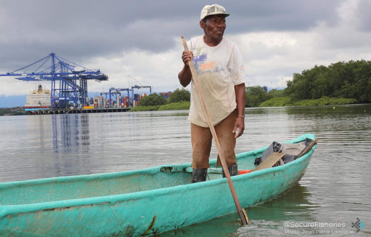 A man fishes on the outskirts of new port development. - Photo by Jean-Pierre Larroque