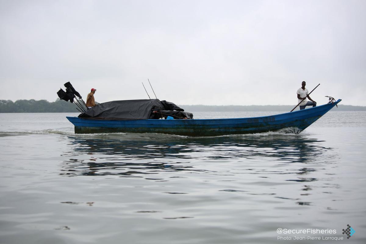 Men heading out to fish. - Photo by Jean-Pierre Larroque