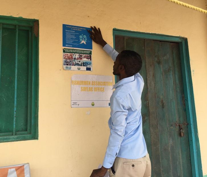 Information about protecting yourself and others during the COVID-19 pandemic is posted in public areas in Zeila, Somaliland. Co-management, fisheries.